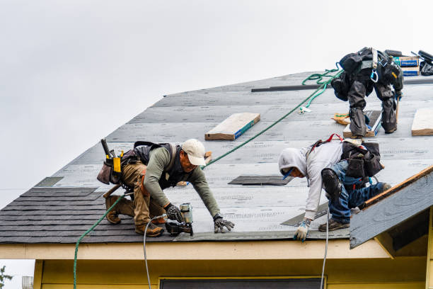 Professional Emergency Roof Repair technician working in Basom, NY